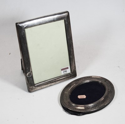 Lot 296 - A modern silver clad easel photograph frame,...
