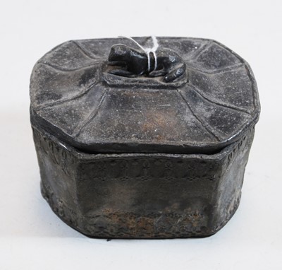 Lot 319 - An 18th century lead tobacco jar of octagonal...