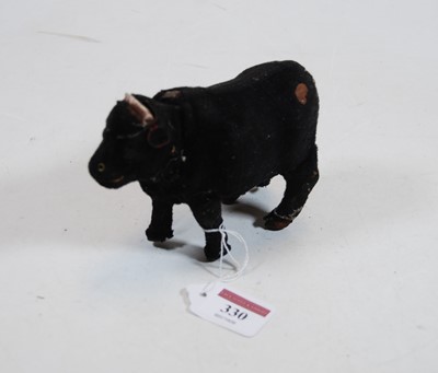 Lot 330 - A Schuco clockwork model of a bull