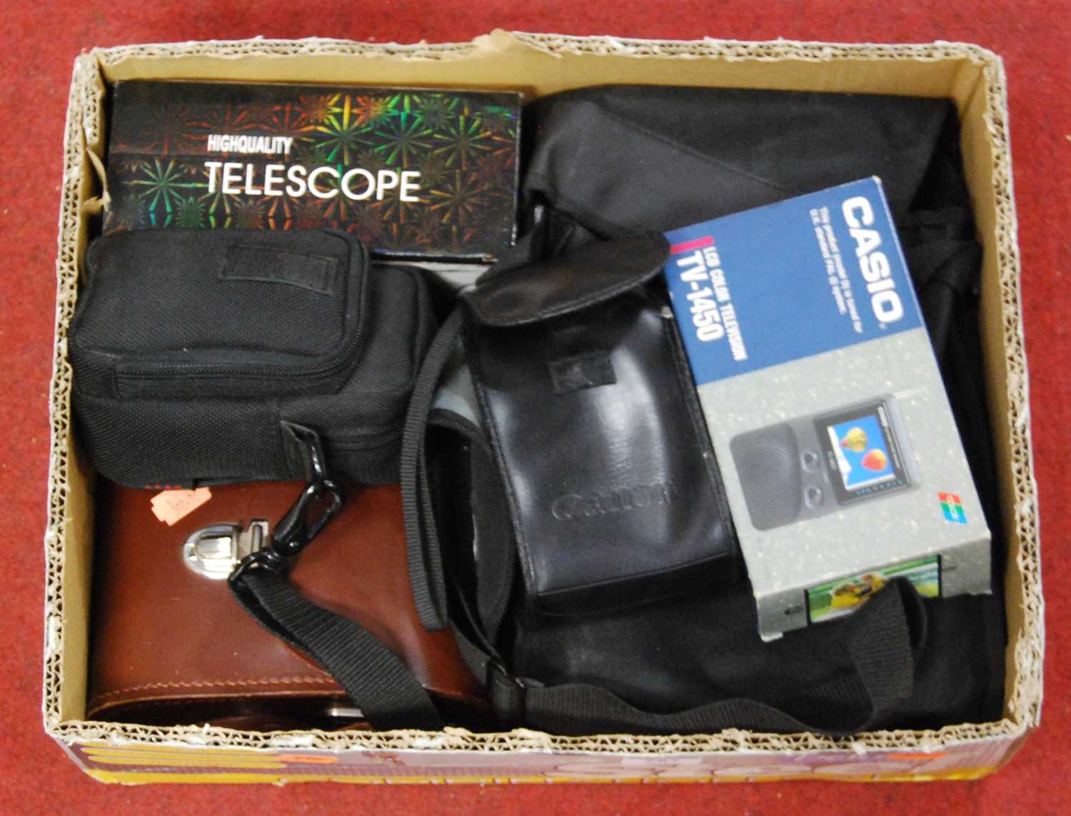Lot 587 - Mixed lot to include Canon 35mm camera, Casio...