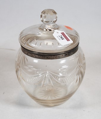 Lot 288 - A 20th century cut glass jar and cover, the...