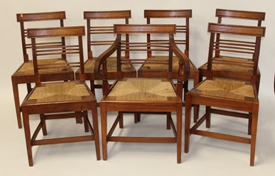 Lot 1185 - A set of six early 19th century elm and rush...