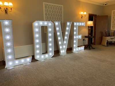 Lot 94 - Love is Us Giant Illuminated Signage Love is...