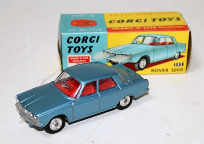 Lot 1679 - A Corgi Toys No. 252 Rover 2000 comprising of...