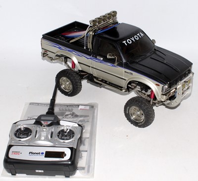 Lot 1581 - A Tamiya 1/10 scale radio controlled kit built...