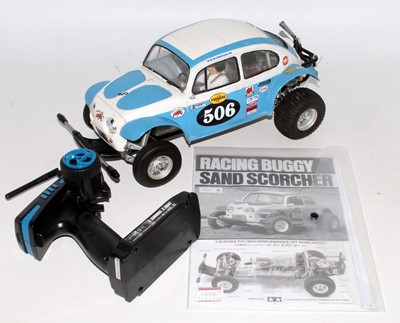 Lot 1582 - A Tamiya 1/10 scale kit built model of a radio...