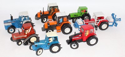 Lot 1323 - Eight various loose Britains farm tractors to...