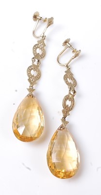 Lot 2206 - A pair of yellow metal citrine drop earrings,...