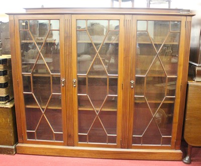 Lot 1220 - An early 20th century mahogany three door...