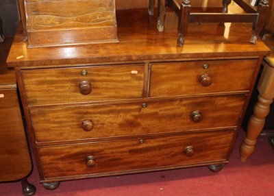 Lot 1224 - A 19th century mahogany chest of two short...