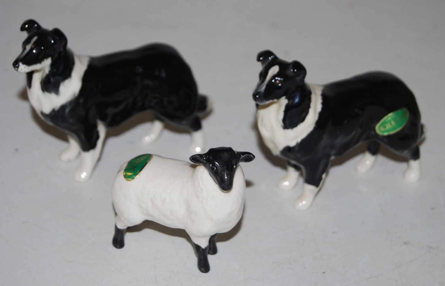 Lot 282 - Two Beswick Border Collie sheepdogs, gloss...