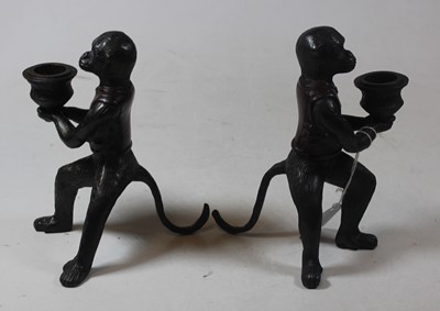 Lot 11 - A pair of modern bronze figural candlesticks,...