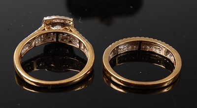 Lot 2203 - A pair of 18ct yellow gold diamond rings, to...