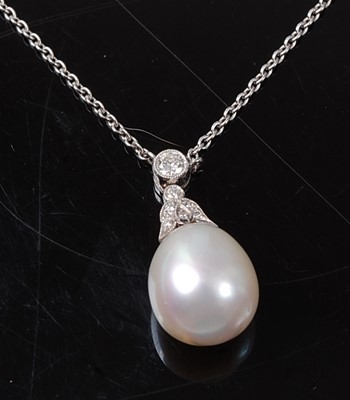Lot 2244 - A white metal, pearl and diamond pendant, the...