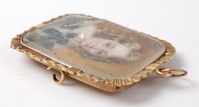 Lot 2228 - An early 19th century yellow metal miniature...