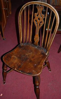 Lot 1383 - A set of four reproduction elm seated dining...