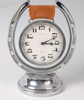 Lot 259 - A mid-20th century chrome cased mantel clock,...