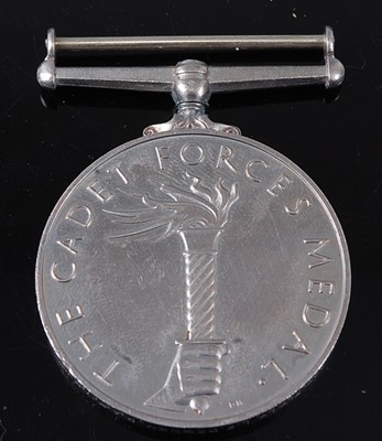 Lot 135 - A Geo. VI Cadet Forces medal, naming ACT. FLT....