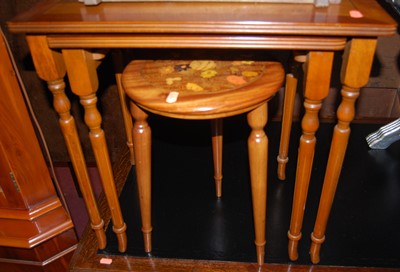 Lot 1418 - A nest of two yew wood occasional tables,...