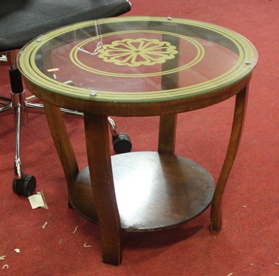 Lot 1417 - An Art Deco walnut and glass topped circular...