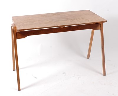 Lot 345 - A 1950s plywood twin school writing desk by...