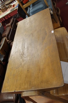 Lot 345 - A 1950s plywood twin school writing desk by...