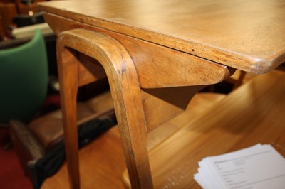 Lot 345 - A 1950s plywood twin school writing desk by...