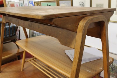 Lot 345 - A 1950s plywood twin school writing desk by...