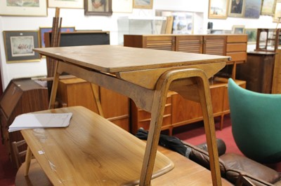 Lot 345 - A 1950s plywood twin school writing desk by...