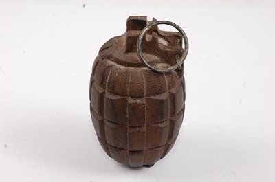 Lot 113 - A Mills No. 23 Mk II hand grenade, the base...