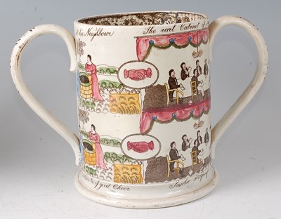 Lot 2062 - A 19th century Staffordshire loving cup,...