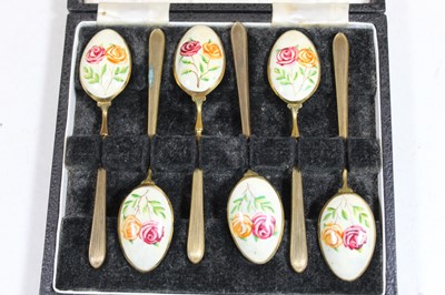 Lot 202 - A set of six gilt metal spoons, each having...