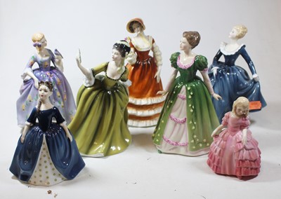 Lot 78 - A collection of seven porcelain figures of...