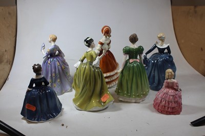 Lot 78 - A collection of seven porcelain figures of...