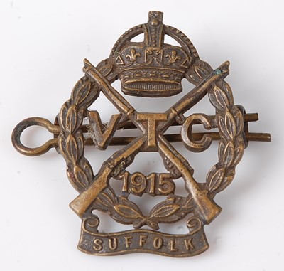 Lot 116 - A WW I cap badge for the Suffolk Volunteer...