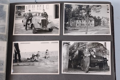 Lot 70 - A post WW II photograph album, the black and...