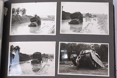 Lot 70 - A post WW II photograph album, the black and...