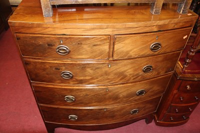 Lot 1353 - A Regency mahogany bowfront chest of drawers,...