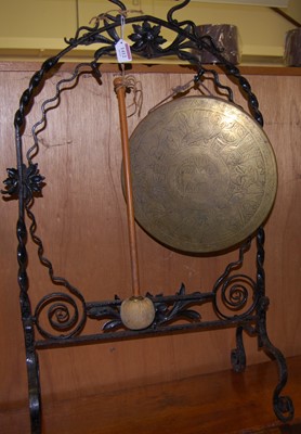 Lot 1412 - An early 20th century wrought iron and brass...