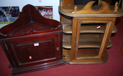 Lot 1255 - A mahogany hanging corner cupboard, w.46cm,...
