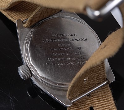 Lot 75 - A Vietnam War U.S. Army steel cased wristwatch,...