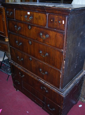 Lot 1440 - An 18th century figured walnut chest on stand...
