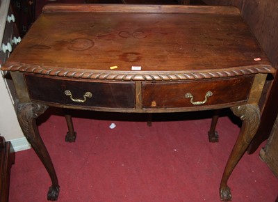 Lot 1442 - An early 20th century bowfront ledgeback two...