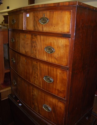 Lot 1447 - A Victorian flame mahogany veneered bowfront...