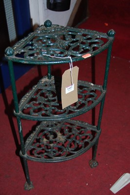 Lot 1443 - A green painted pierced and cast metal three...