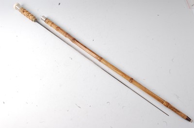 Lot 166 - A late 19th century French bamboo sword stick,...