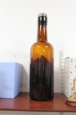 Lot 24 - A Whitbread's oversized brown glass Pale Ale...