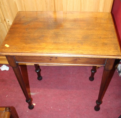 Lot 1464 - A 19th century mahogany side table, on onion...