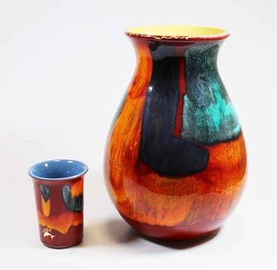 Lot 83 - A Poole pottery volcano vase having raised...