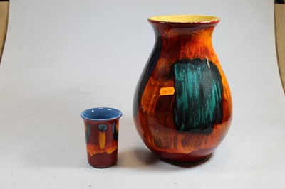 Lot 83 - A Poole pottery volcano vase having raised...